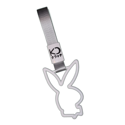 White bunny drift charm or drift ring. Inspired by bus, train, and subway handles (or Tsurikawas) that were rebelliously repurposed for automotive decoration.